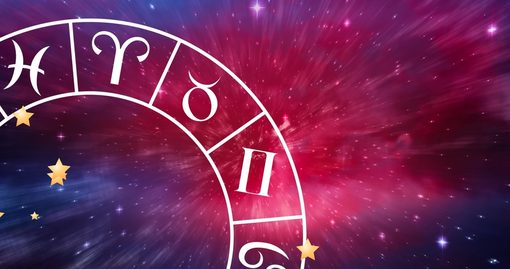 Image of zodiac wheel spinning on starry night sky. Horoscope, zodiac, star signs and astrology concept digitally generated image.